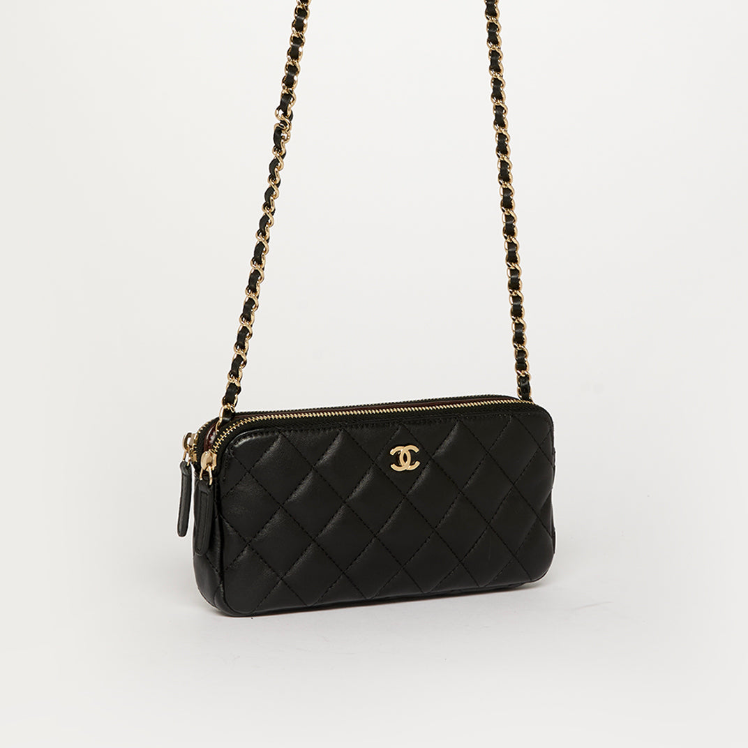 Small CC Quilted Lambskin Clutch With Chain in Black