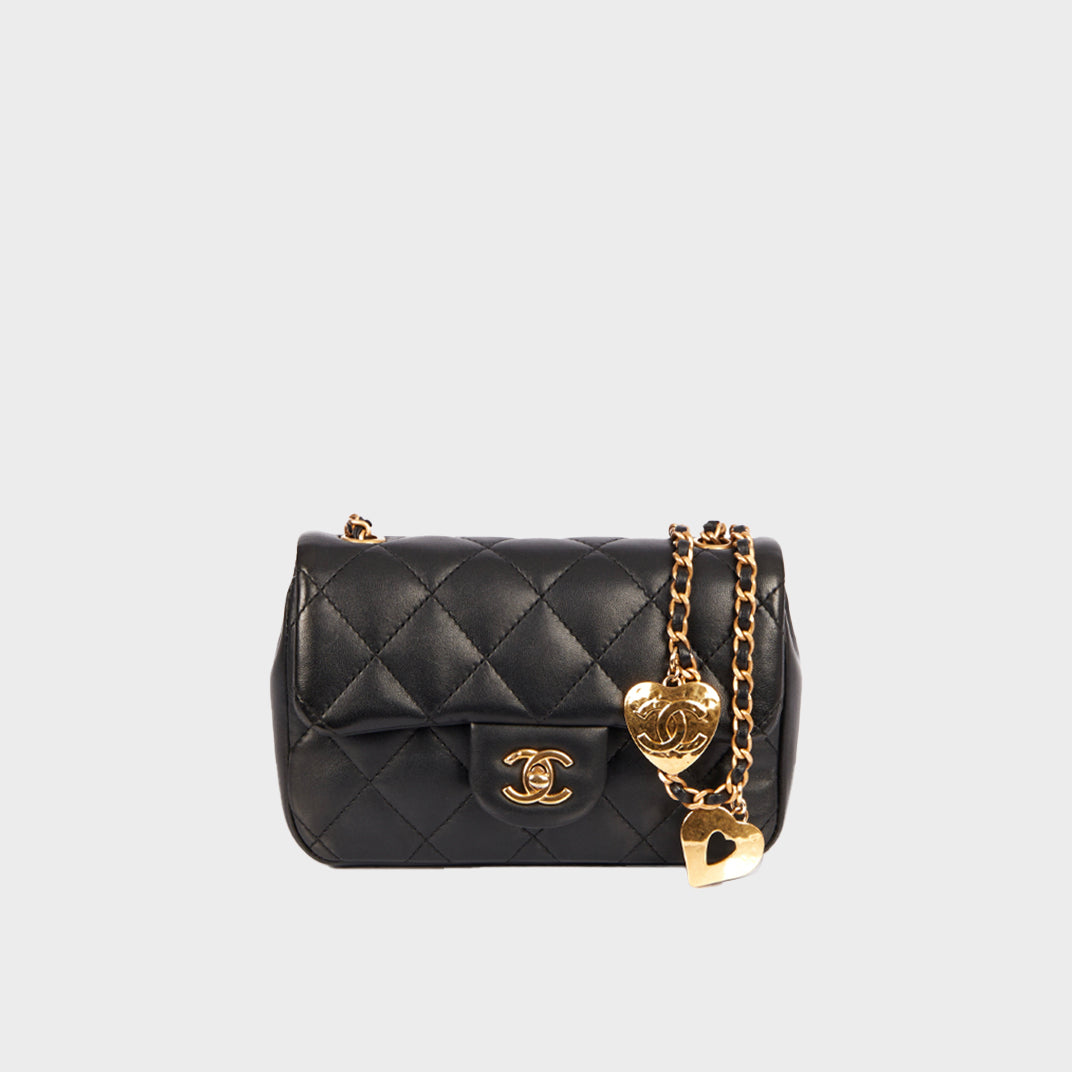 Heart Charms Mini Flap Bag in Black Calfskin