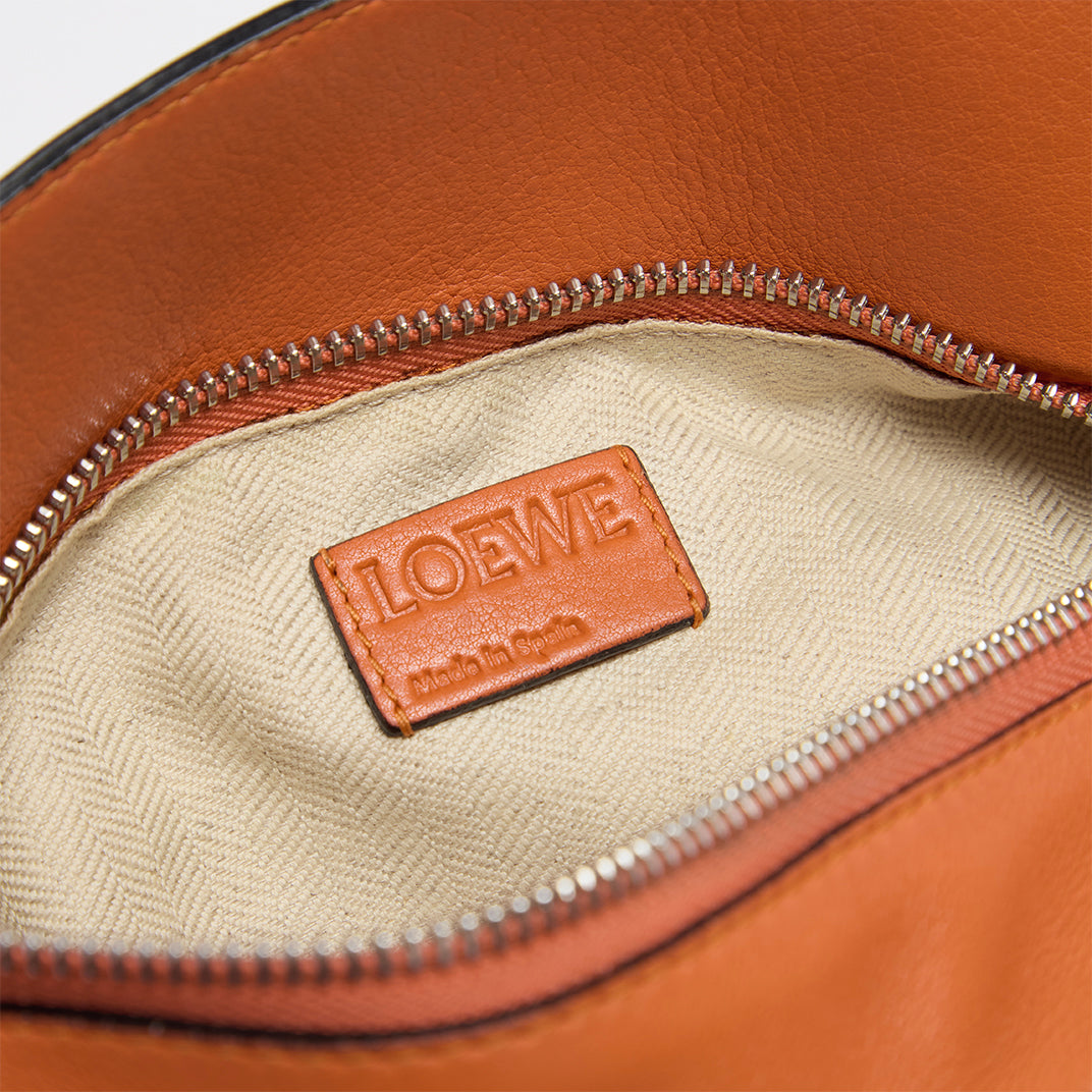 Puzzle Small Leather Shoulder Bag in Orange