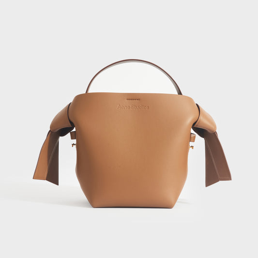 Musubi Mini Knotted Leather Crossbody Bag in Tan