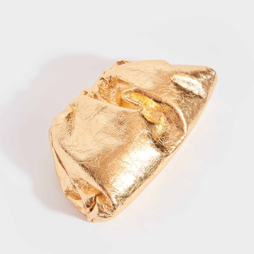 Bottega Veneta new metallic gold pouches #metallicleather Bottega Veneta  new small and large pouch in crinkled met…