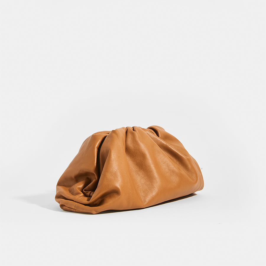 Side view of BOTTEGA VENETA Tan Large Pouch