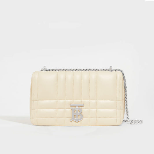 Front view of the BURBERRY Small Quilted Lola Bag in Pale Vanilla