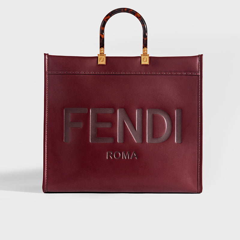 Fendi, Bags, Fendi Convertible Clutch Shoulder Bag Patent Tortoise  Leather To You Logo Maroon