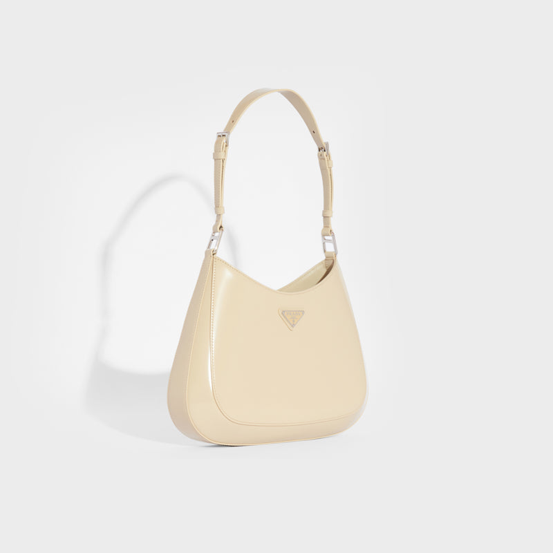 Side view of the PRADA Cleo Shoulder Bag in Desert Beige